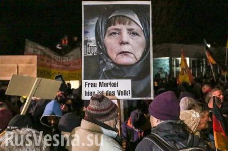 Германия в огне: протестующие жгут автомобили и крушат витрины (ВИДЕО)