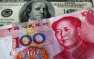Китай продолжает девальвировать юань. Пугает ли это США?