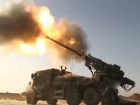 Французская и американская артиллерия осуществляют поддержку иракским войск ...